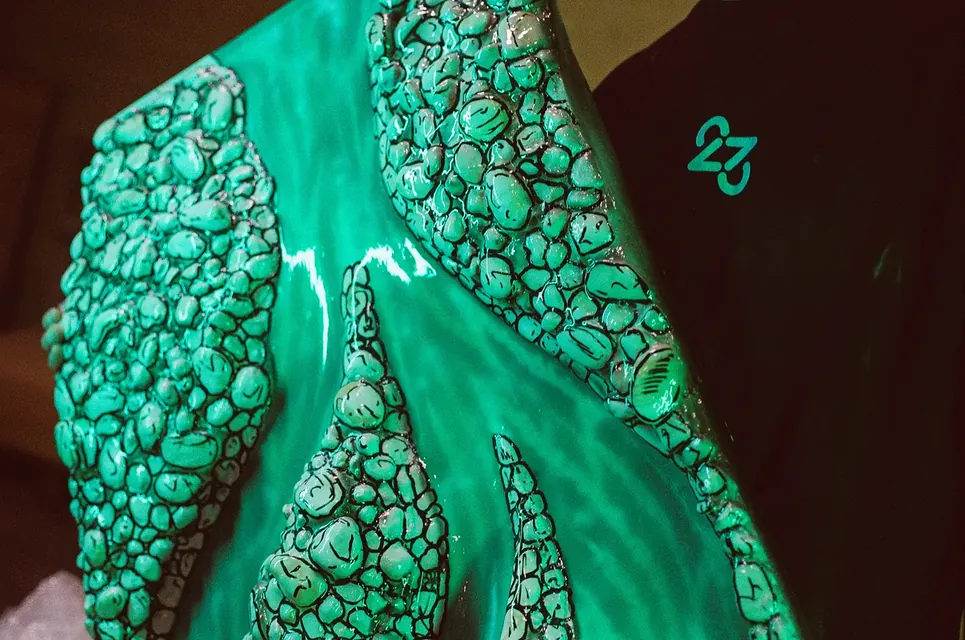 A sculpted green scale texture